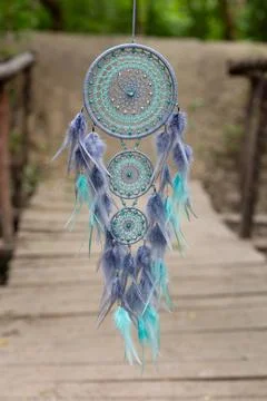 Handmade dream catcher with feathers threads and beads rope hanging Stock Photos