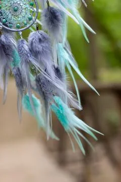 Handmade dream catcher with feathers threads and beads rope hanging Stock Photos