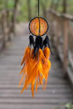 Handmade dream catcher with feathers threads and beads rope hanging Stock Photos
