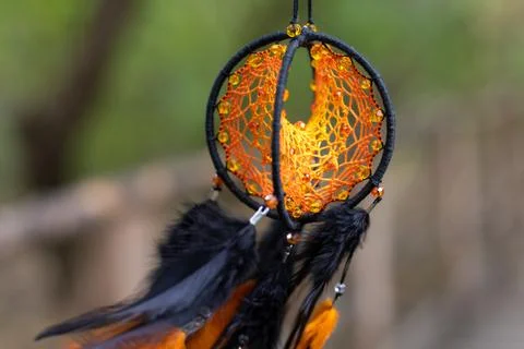Handmade dream catcher with feathers threads and beads rope hanging Foto stock