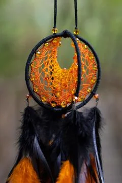 Handmade dream catcher with feathers threads and beads rope hanging Stock Photos