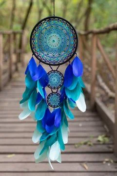 Handmade dream catcher with feathers threads and beads rope hanging Stock Photos