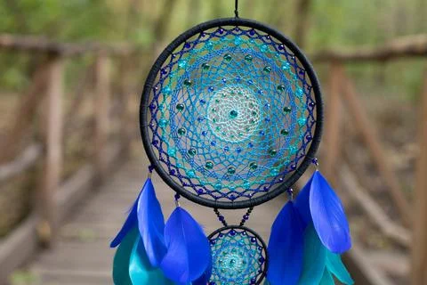Handmade dream catcher with feathers threads and beads rope hanging Stock Photos