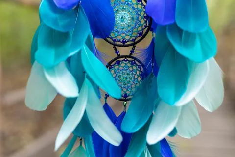 Handmade dream catcher with feathers threads and beads rope hanging Foto stock