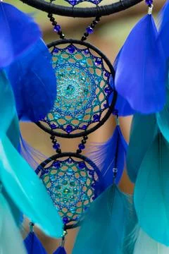 Handmade dream catcher with feathers threads and beads rope hanging Stock Photos