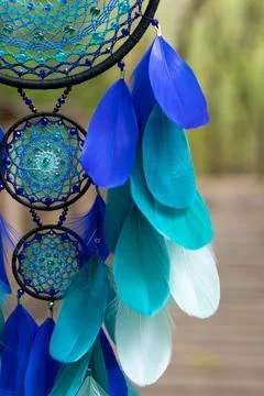 Handmade dream catcher with feathers threads and beads rope hanging Stock Photos