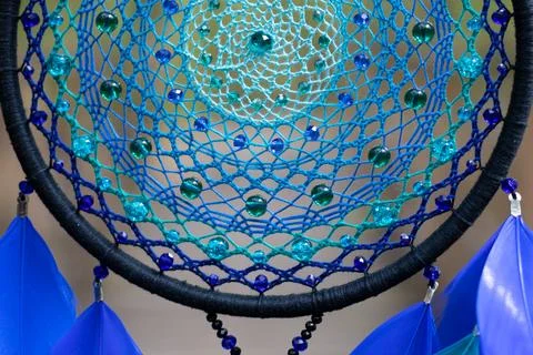Handmade dream catcher with feathers threads and beads rope hanging Stock-Fotos