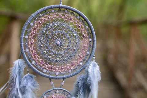 Handmade dream catcher with feathers threads and beads rope hanging Stock Photos