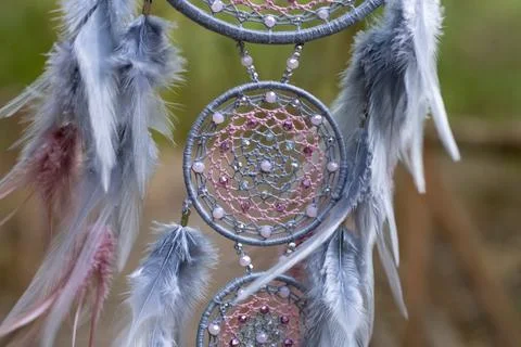 Handmade dream catcher with feathers threads and beads rope hanging Stock Photos