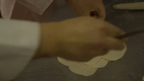 Handmade Dumpling Wrappers Being Prepared in Beijing Street Food Kitchen, China Stock Footage 345881050