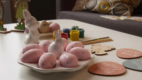 Handmade Dyed Egg Plates on Festive Easter Table Stock Footage 327888414