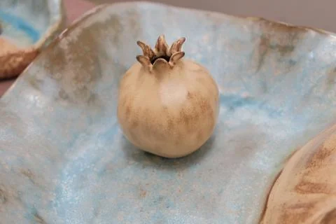 Handmade earthenware in the shape of fruit Stock Photos