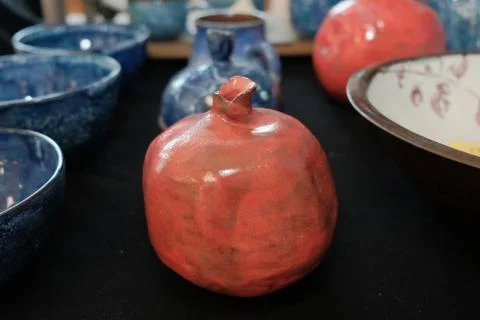 Handmade earthenware in the shape of fruit Stock Photos