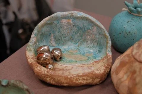 Handmade earthenware in the shape of fruit Stock Photos