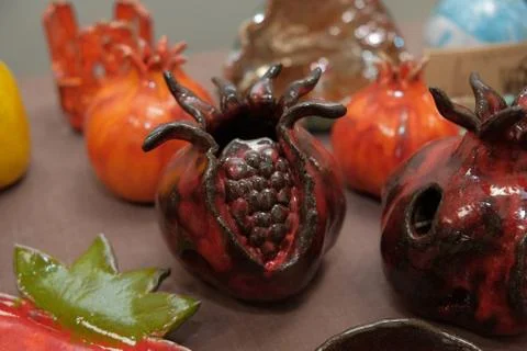 Handmade earthenware in the shape of fruit Stock Photos