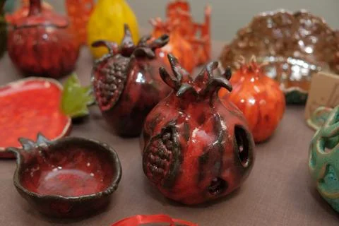 Handmade earthenware in the shape of fruit Stock Photos