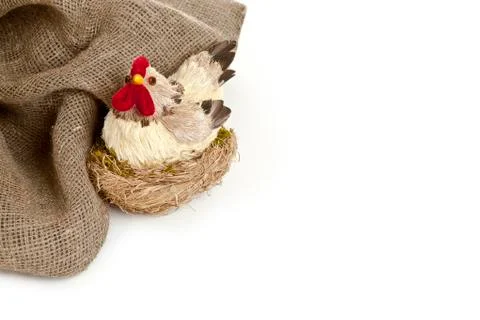 Handmade Easter chicken in the nest background Stock Photos