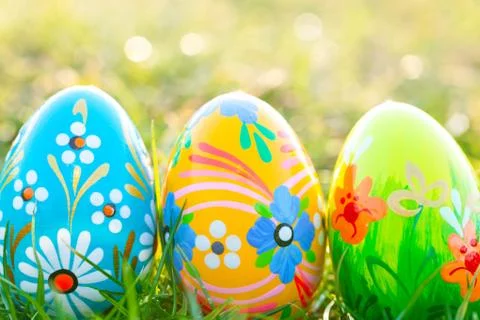 Handmade Easter eggs on grass. Spring patterns art, unique. Stock-Fotos