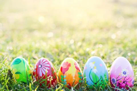 Handmade Easter eggs on grass. Spring patterns art, unique. Stock-Fotos