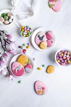Handmade Easter gingerbread cookies and chocolate eggs. Stock Photos