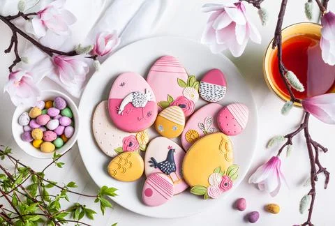 Handmade Easter gingerbread cookies and chocolate eggs. Stock Photos