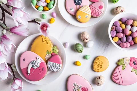 Handmade Easter gingerbread cookies and chocolate eggs. Stock Photos
