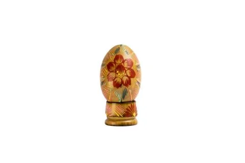 Handmade Easter wooden egg on a stand isolate Stock Photos
