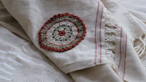 Handmade embroidered fabrics 3 Stock Footage 293983390