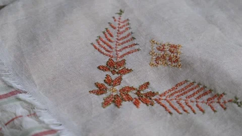 Handmade embroidered fabrics Stock Footage 293983380