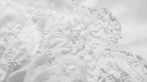 Handmade embroidered lace close-up, rotating background, top view Stock Footage 337415383