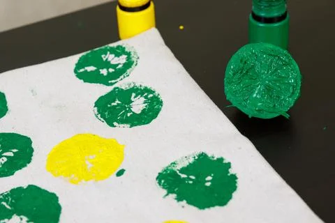 Handmade exclusive print pattern. diy Printing Stamps lemons on clothes. step-by Stock Photos
