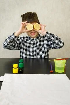 Handmade exclusive print pattern. diy Printing Stamps lemons on clothes. step-by Stock Photos