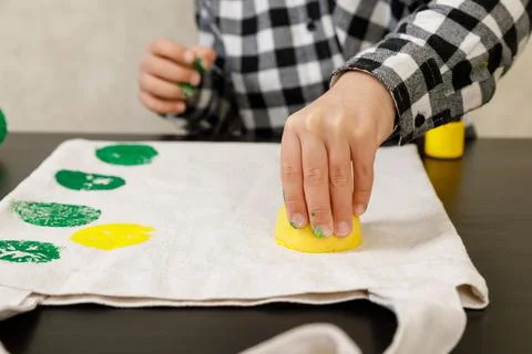 Handmade exclusive print pattern. diy Printing Stamps lemons on clothes. step-by Stock Photos