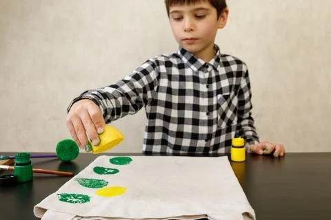 Handmade exclusive print pattern. diy Printing Stamps lemons on clothes. step-by Stock Photos