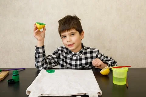 Handmade exclusive print pattern. diy Printing Stamps lemons on clothes. step-by Stock Photos