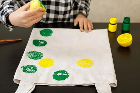 Handmade exclusive print pattern. diy Printing Stamps lemons on clothes. step-by Stock Photos