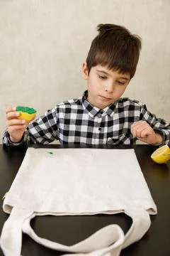 Handmade exclusive print pattern. diy Printing Stamps lemons on clothes. step-by Stock Photos