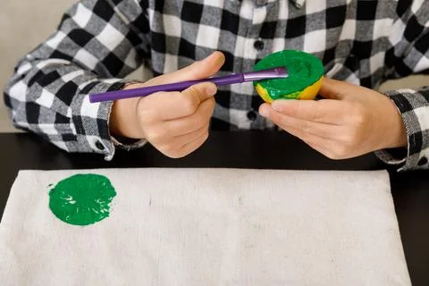 Handmade exclusive print pattern. diy Printing Stamps lemons on clothes. step-by Stock Photos