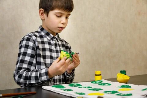 Handmade exclusive print pattern. diy Printing Stamps lemons on clothes. step-by Stock Photos