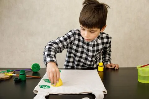 Handmade exclusive print pattern. diy Printing Stamps lemons on clothes. step-by Stock Photos
