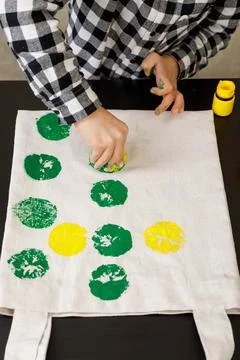 Handmade exclusive print pattern. diy Printing Stamps lemons on clothes. step-by Stock Photos