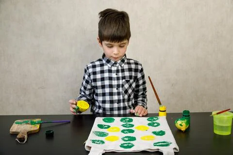 Handmade exclusive print pattern. diy Printing Stamps lemons on clothes. step-by Stock Photos