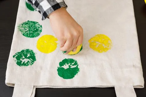 Handmade exclusive print pattern. diy Printing Stamps lemons on clothes. step-by Stock Photos