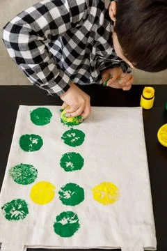 Handmade exclusive print pattern. diy Printing Stamps lemons on clothes. step-by Stock Photos
