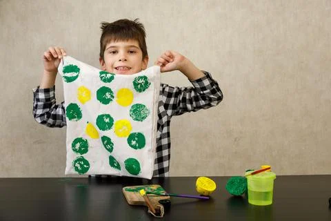 Handmade exclusive print pattern. diy Printing Stamps lemons on clothes. step-by Stock Photos