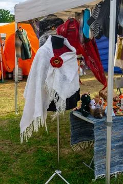 Handmade Felted Wool Shawl with Red Flower Brooch on Mannequin Stock Photos