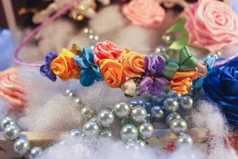 Handmade flowers by ribbons Stock Photos
