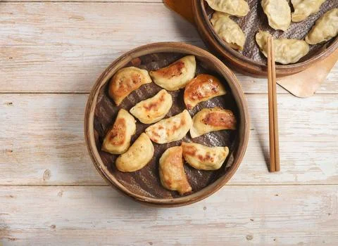 Handmade fried dumplings with steamed dumpling or momo served in wooden dis.. Stock Photos