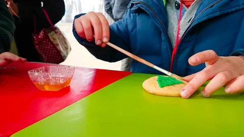 Handmade Ginger Biscuits, Kid Decorating Christmas Cookies Stock Footage 83517984