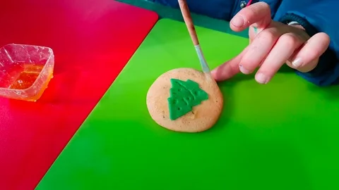 Handmade Ginger Biscuits, Kid Decorating Christmas Cookies 3 Stock Footage 83520115